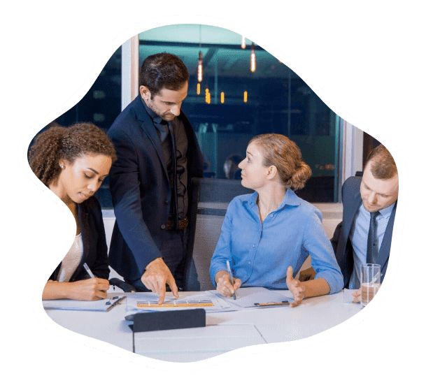 Business team discussing documents in a meeting